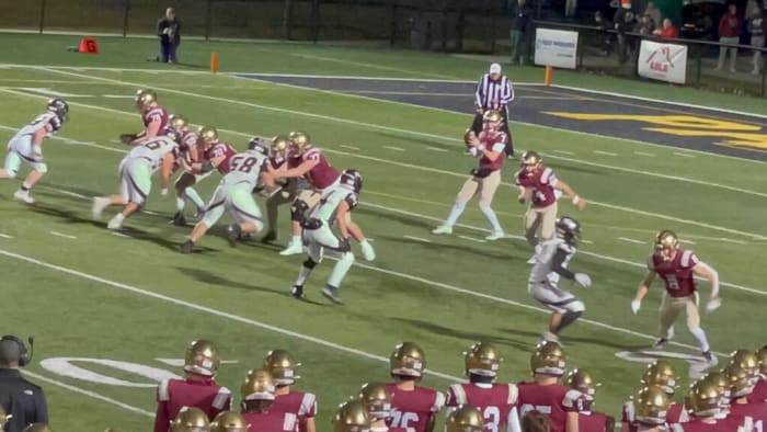 Bishop Watterson quarterback AJ McAninch takes a snap in a playoff game against Miami Trace on November 3, 2023. Photo Credit: Aaron Blankenship